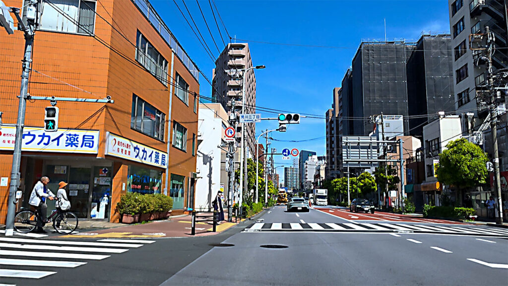 荒川三丁目交差点付近からサンポップマチヤ方面へ向かう明治通り